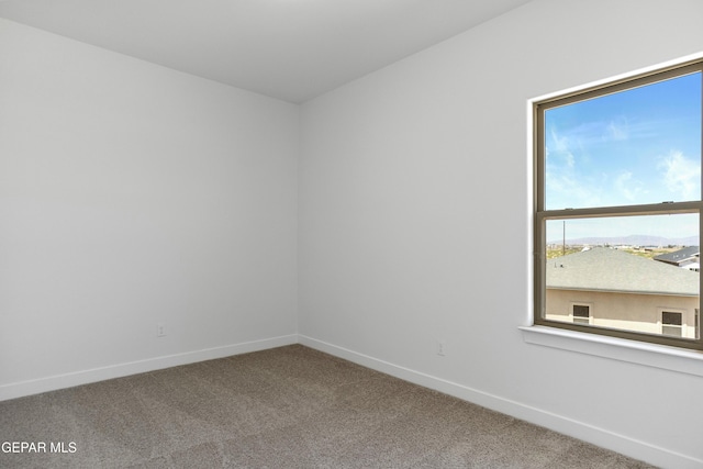 10700 Elise St, El Paso, TX 79924 - carpeted empty room featuring baseboards
