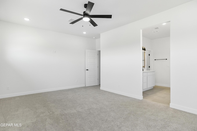 10700 Elise St, El Paso, TX 79924 - spare room with light carpet, ceiling fan, recessed lighting, and baseboards