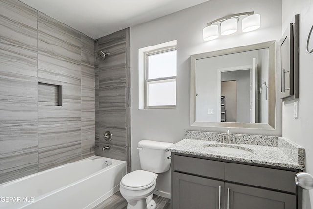 13804 Flora Vista Ave, Horizon City, TX 79928 - full bathroom with vanity, bathtub / shower combination, toilet, wood finished floors, and baseboards