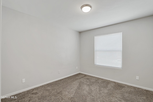 13804 Flora Vista Ave, Horizon City, TX 79928 - spare room with carpet floors and baseboards
