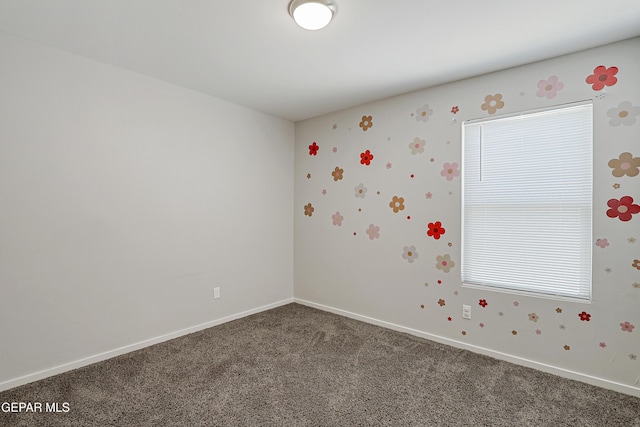13804 Flora Vista Ave, Horizon City, TX 79928 - spare room featuring carpet flooring and baseboards