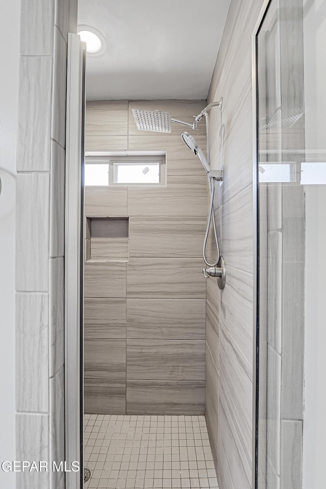 13804 Flora Vista Ave, Horizon City, TX 79928 - full bathroom with a shower stall and tile patterned flooring