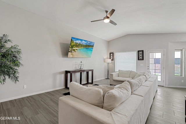 13804 Flora Vista Ave, Horizon City, TX 79928 - living room with a ceiling fan, lofted ceiling, baseboards, and wood finish floors