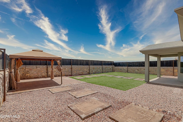 13804 Flora Vista Ave, Horizon City, TX 79928 - view of yard featuring a gazebo and a patio