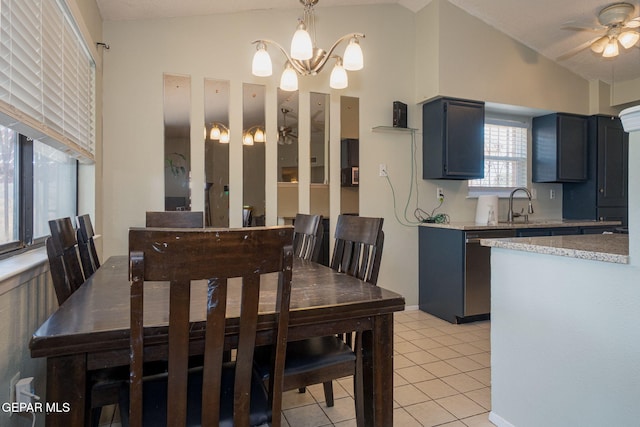 1662 Gene Torres Dr, El Paso, TX 79936 - dining area featuring lofted ceiling, ceiling fan, and light tile patterned floors