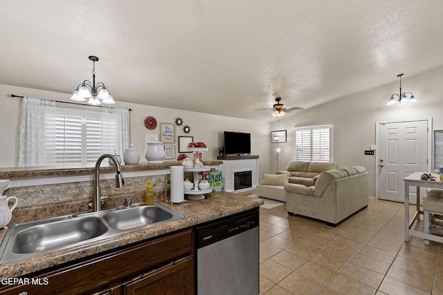 14239 Trigger Rock Ln, El Paso, TX 79938 - kitchen with stainless steel dishwasher, a sink, a chandelier, lofted ceiling, and ceiling fan
