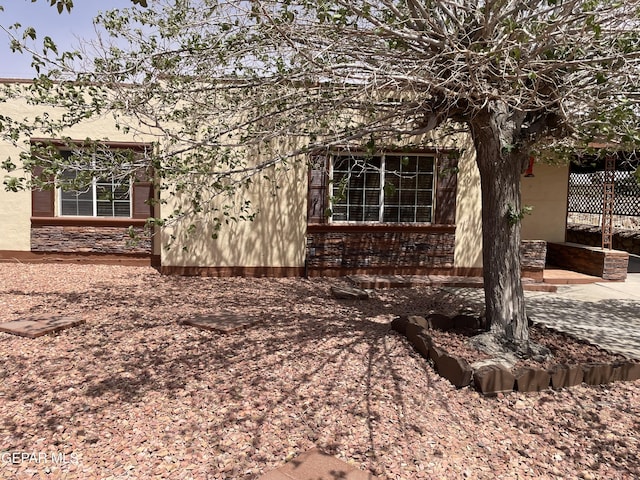8324 Diana Dr, El Paso, TX 79904 - view of property exterior featuring stone siding