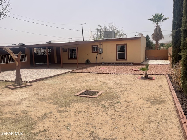 8324 Diana Dr, El Paso, TX 79904 - back of house featuring fence and stucco siding