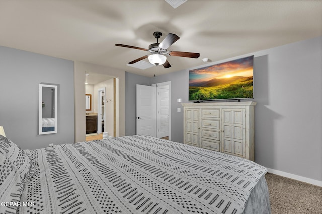 14953 Willie Worsley Ave, El Paso, TX 79938 - bedroom with carpet, baseboards, connected bathroom, and ceiling fan