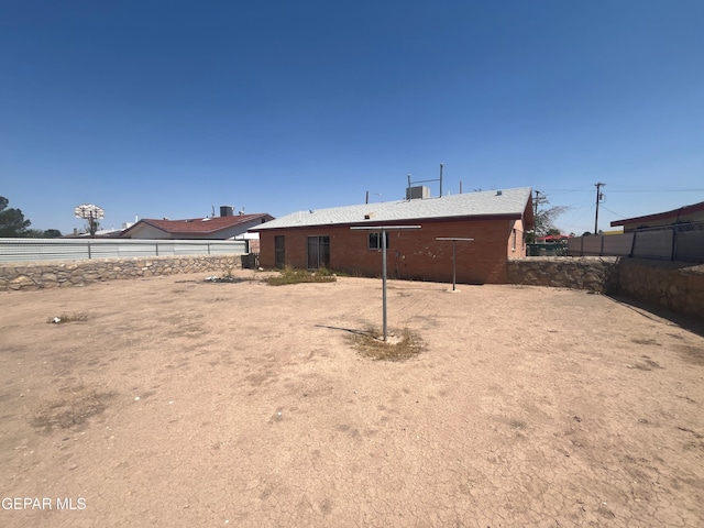 9348 Elgin Dr, El Paso, TX 79907 - rear view of house featuring fence