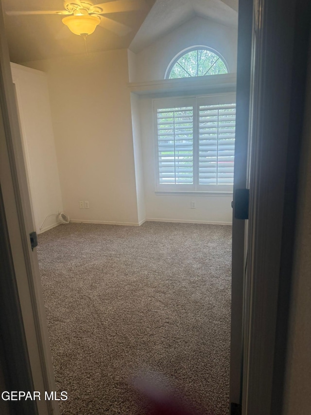 4560 Loma Canada Ct, El Paso, TX 79934 - carpeted empty room with lofted ceiling and ceiling fan