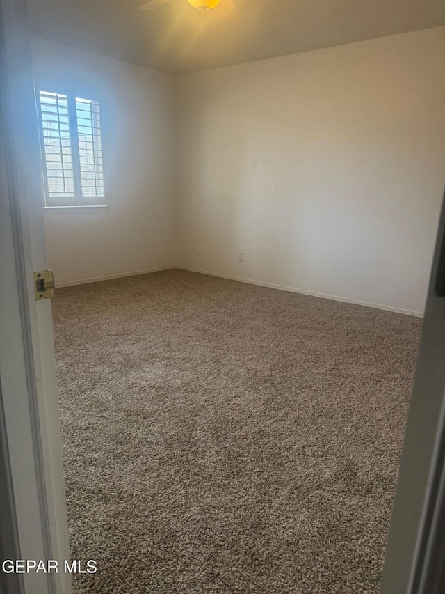 4560 Loma Canada Ct, El Paso, TX 79934 - spare room with carpet flooring and ceiling fan