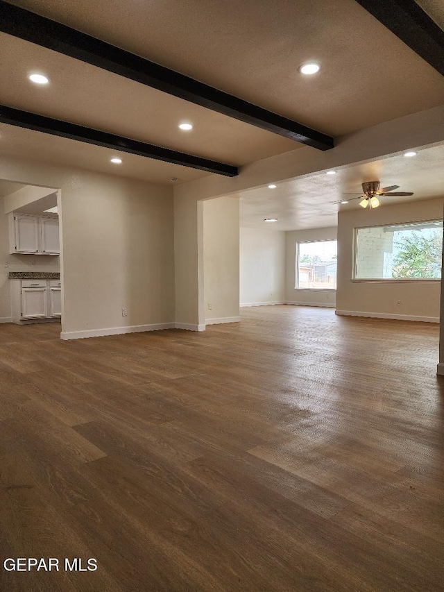 301 Bandolina Dr, Socorro, TX 79927 - unfurnished living room featuring beam ceiling, wood finished floors, recessed lighting, baseboards, and ceiling fan
