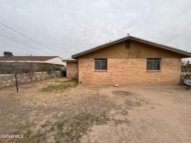 952 Zacatecas Ct, El Paso, TX 79907 - view of side of home featuring brick siding