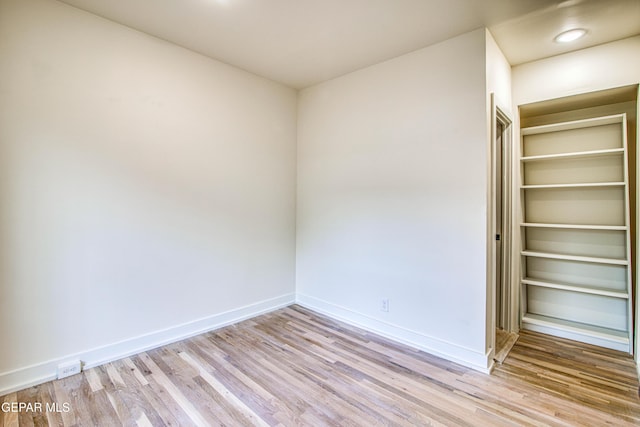 2300 N Campbell St, El Paso, TX 79902 - unfurnished bedroom with light wood-type flooring and a closet