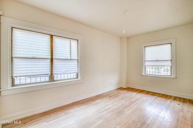 2300 N Campbell St, El Paso, TX 79902 - spare room featuring wood finished floors and baseboards