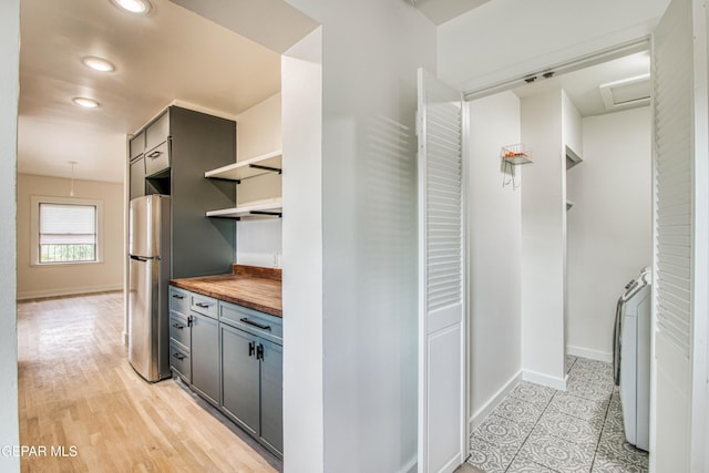 2300 N Campbell St, El Paso, TX 79902 - corridor with recessed lighting, attic access, and washer / dryer