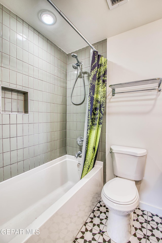 2300 N Campbell St, El Paso, TX 79902 - bathroom featuring tile patterned floors and shower / bath combination with curtain