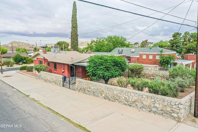 2300 N Campbell St, El Paso, TX 79902 - view of front of property with a fenced front yard