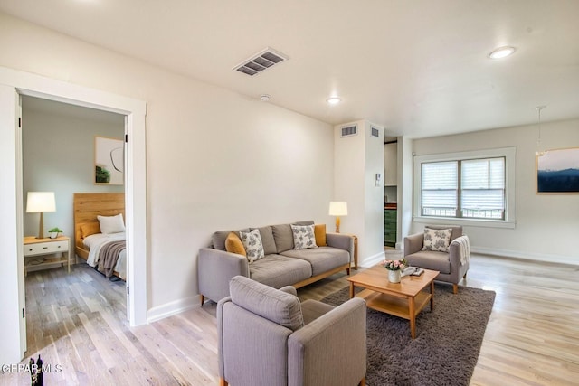 2300 N Campbell St, El Paso, TX 79902 - living room featuring light wood-style floors and recessed lighting
