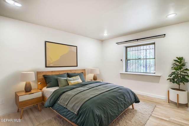 2300 N Campbell St, El Paso, TX 79902 - bedroom featuring wood finished floors and recessed lighting