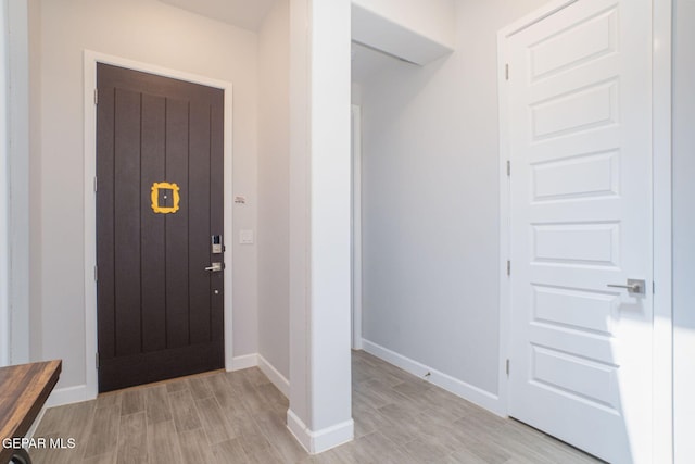 7389 Cimarron Gap Dr, El Paso, TX 79911 - entrance foyer featuring light wood finished floors and baseboards