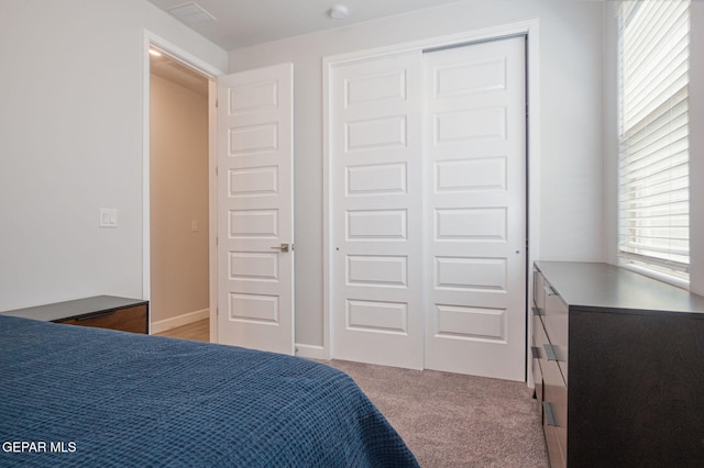 7389 Cimarron Gap Dr, El Paso, TX 79911 - bedroom with a closet and light carpet