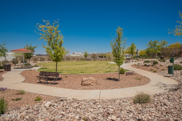 7389 Cimarron Gap Dr, El Paso, TX 79911 - surrounding community featuring a lawn