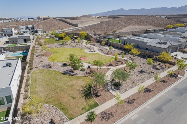 7389 Cimarron Gap Dr, El Paso, TX 79911 - aerial view of residential area featuring a mountainous background