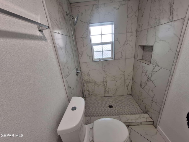11574 La Poblana Dr, Socorro, TX 79927 - full bath featuring marble finish flooring, toilet, and a shower stall