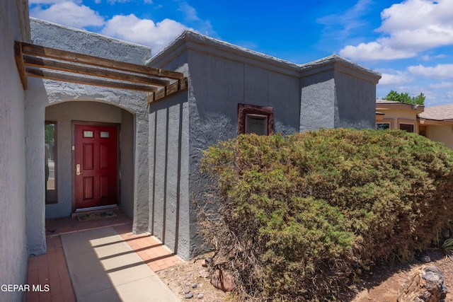 903 Agua Caliente Dr, El Paso, TX 79912 - view of exterior entry featuring stucco siding