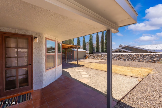 903 Agua Caliente Dr, El Paso, TX 79912 - view of patio / terrace with a shed, an outbuilding, and a fenced backyard