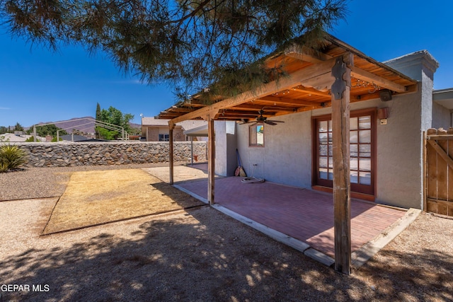 903 Agua Caliente Dr, El Paso, TX 79912 - view of patio featuring a ceiling fan and fence