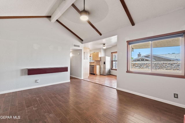 903 Agua Caliente Dr, El Paso, TX 79912 - unfurnished living room with a ceiling fan, wood finished floors, and baseboards