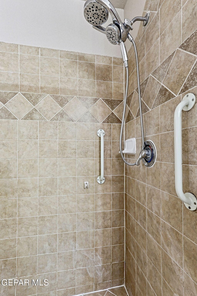 14181 Rudy Valdez Dr, El Paso, TX 79938 - bathroom with a tile shower