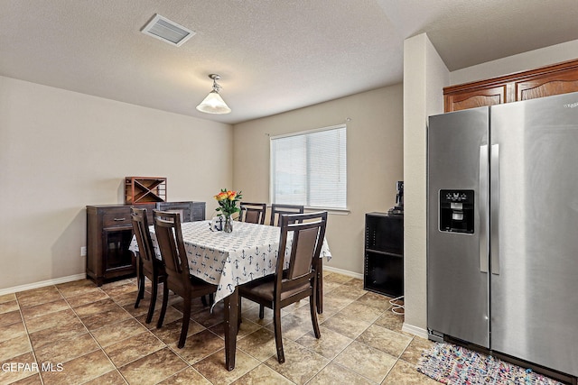 14181 Rudy Valdez Dr, El Paso, TX 79938 - dining room featuring baseboards