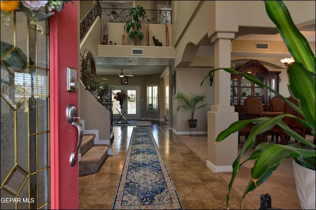 1337 Emerald Gate Ln, El Paso, TX 79936 - foyer entrance featuring a towering ceiling, baseboards, and stairs