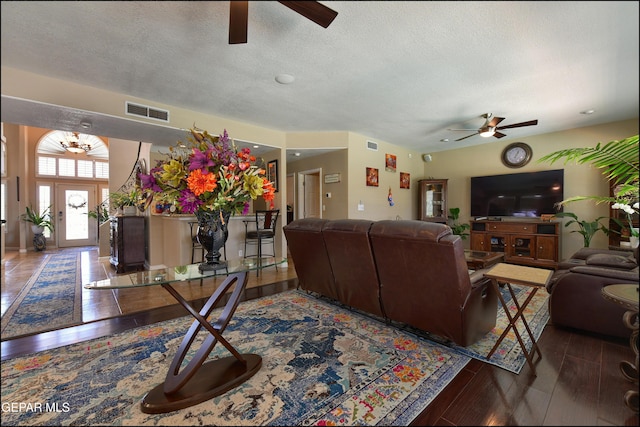 1337 Emerald Gate Ln, El Paso, TX 79936 - living room with ceiling fan, a textured ceiling, and wood finished floors