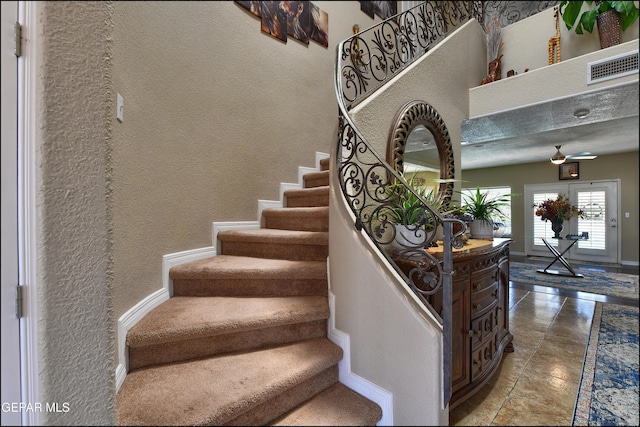 1337 Emerald Gate Ln, El Paso, TX 79936 - stairs with a textured wall, baseboards, and a ceiling fan