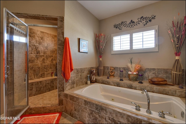 1337 Emerald Gate Ln, El Paso, TX 79936 - bathroom featuring a whirlpool tub and a stall shower