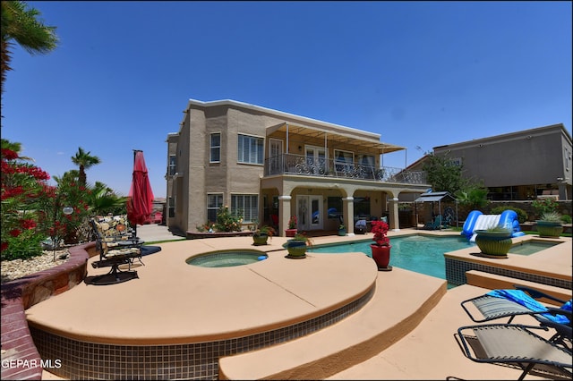 1337 Emerald Gate Ln, El Paso, TX 79936 - view of pool featuring an in-ground hot tub and a patio