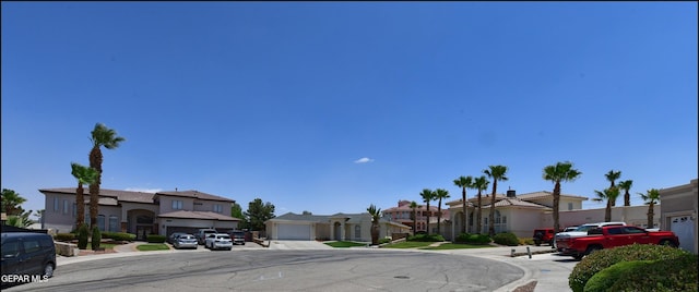 1337 Emerald Gate Ln, El Paso, TX 79936 - view of asphalt road with a residential view and curbs