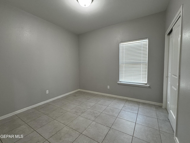 11500 Summer Dr Unit A & B, Socorro, TX 79927 - empty room with light tile patterned floors and baseboards