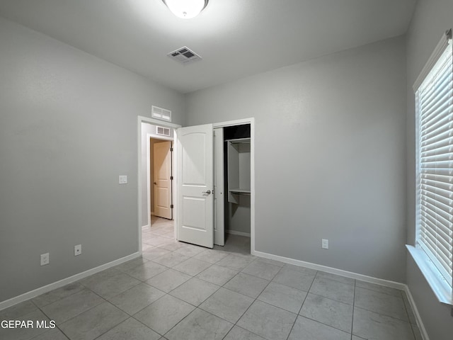 11500 Summer Dr Unit A & B, Socorro, TX 79927 - unfurnished bedroom featuring light tile patterned floors, baseboards, and a closet