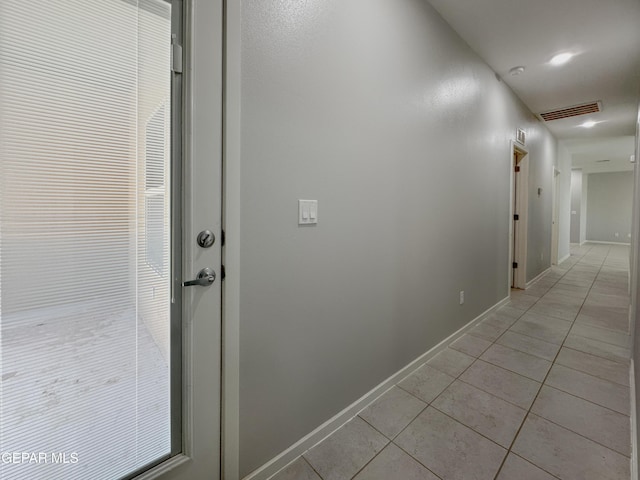 11500 Summer Dr Unit A & B, Socorro, TX 79927 - hall featuring light tile patterned flooring and baseboards