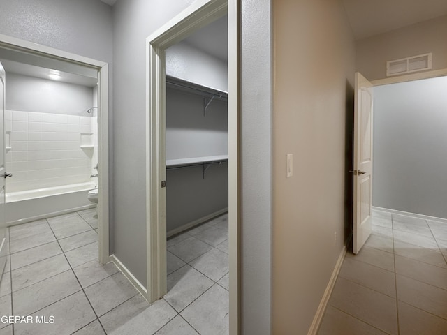11500 Summer Dr Unit A & B, Socorro, TX 79927 - hallway with light tile patterned floors and baseboards