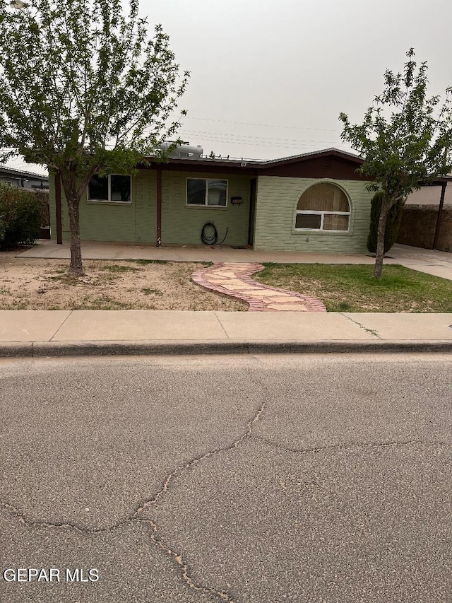 1017 Ralpheene St, El Paso, TX 79907 - ranch-style home with concrete driveway