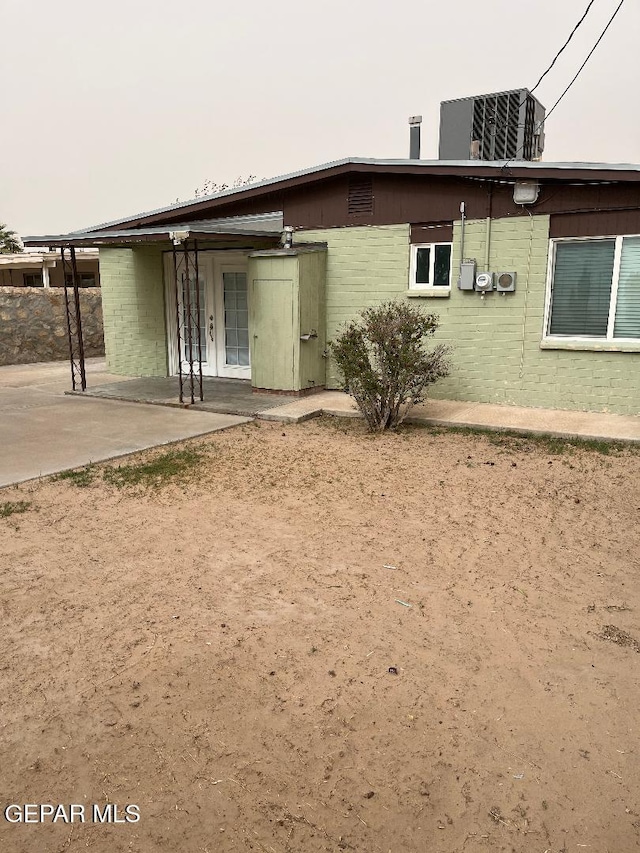 1017 Ralpheene St, El Paso, TX 79907 - rear view of property with a patio area