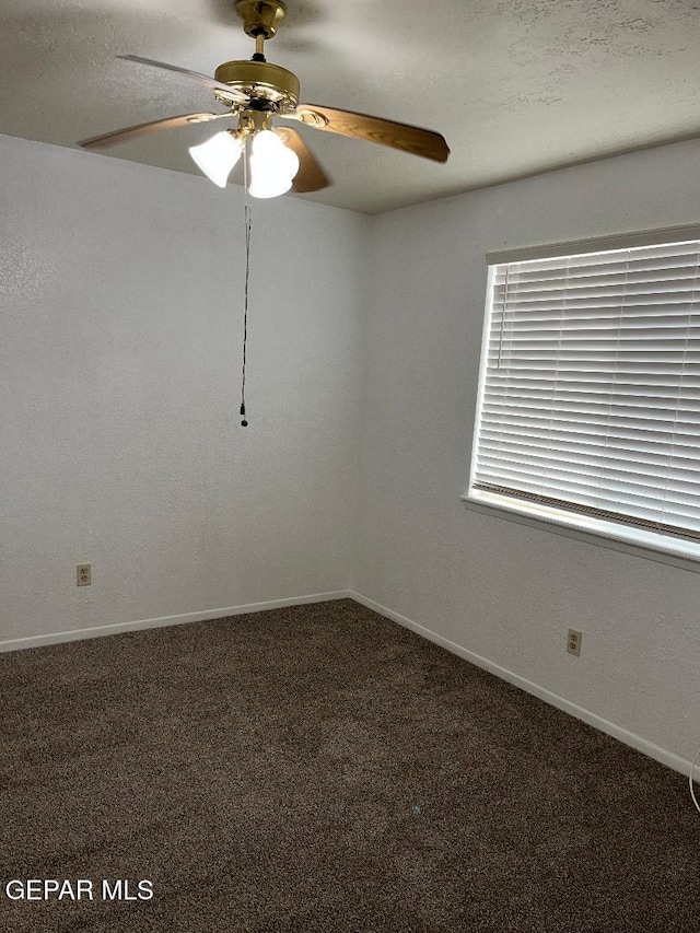 1017 Ralpheene St, El Paso, TX 79907 - empty room featuring carpet floors, a ceiling fan, and baseboards