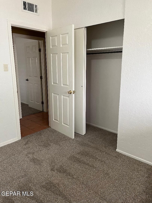 1017 Ralpheene St, El Paso, TX 79907 - unfurnished bedroom with carpet flooring, a closet, and baseboards